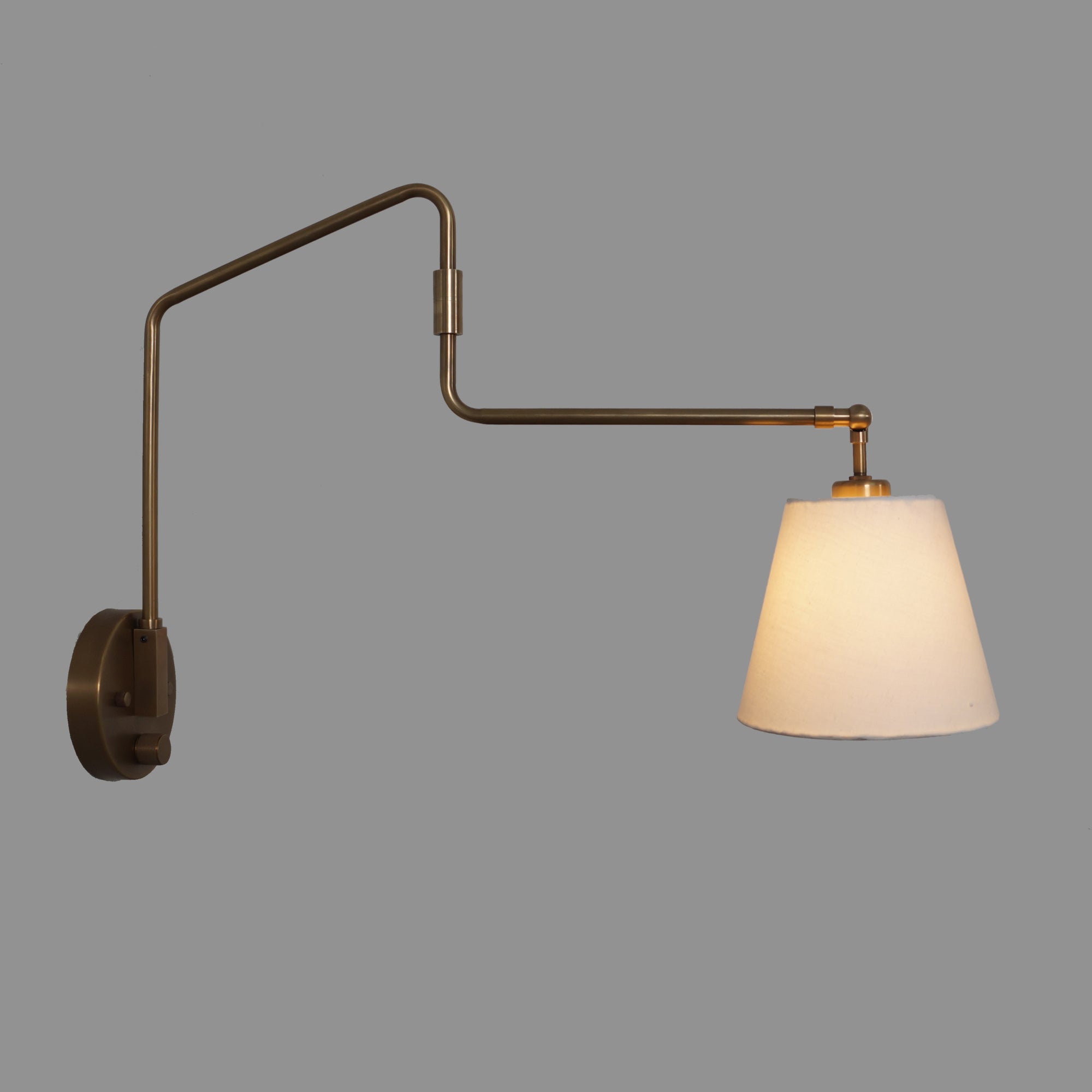 Novel Brass Swing Arm Wall Lamp - Doozie Light Studio